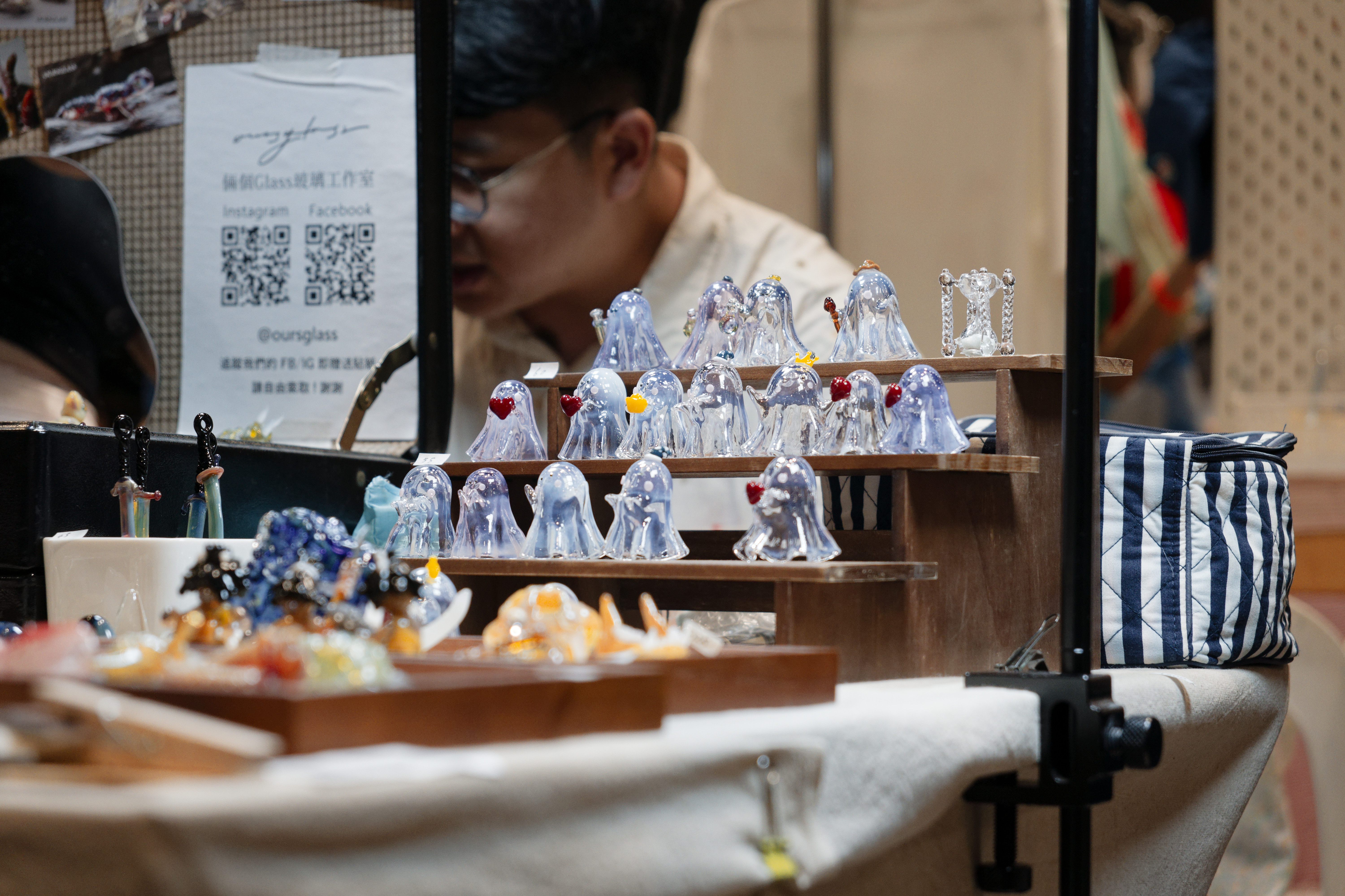 a stall with glassware at an art fair